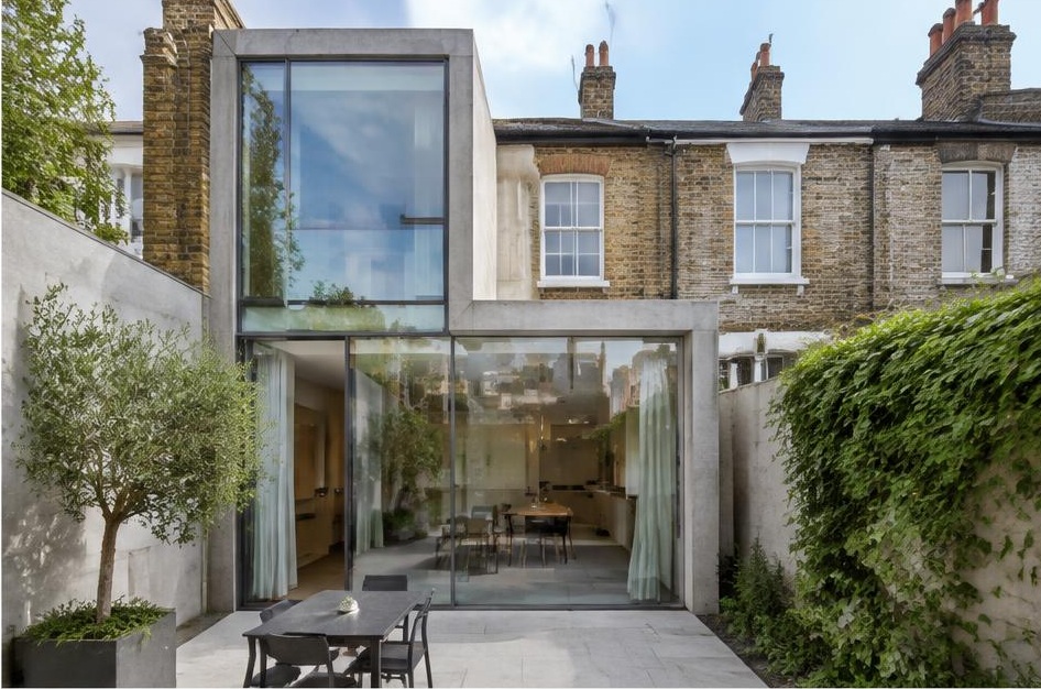 Contemporary glazed garden extension behind a period home in Sands End