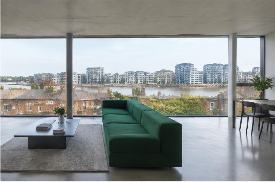 Minimalist living room with a structured fabric sofa and views of Sands End homes and gardens