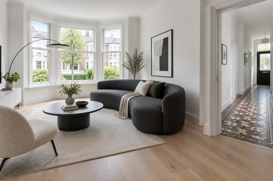 Refurbished modern interior with a retained period feature in Shortlands