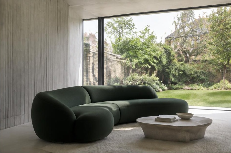 Minimalist garden living space with broad glazing in St Margaret's