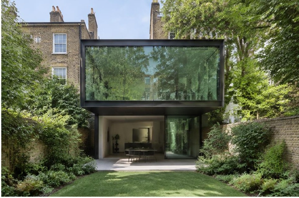 Contemporary glazed garden extension behind a period home in Stockwell