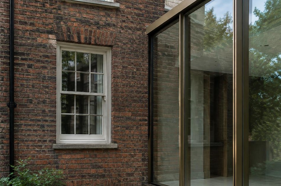 Period facade beside a new contemporary extension in Strand on the Green