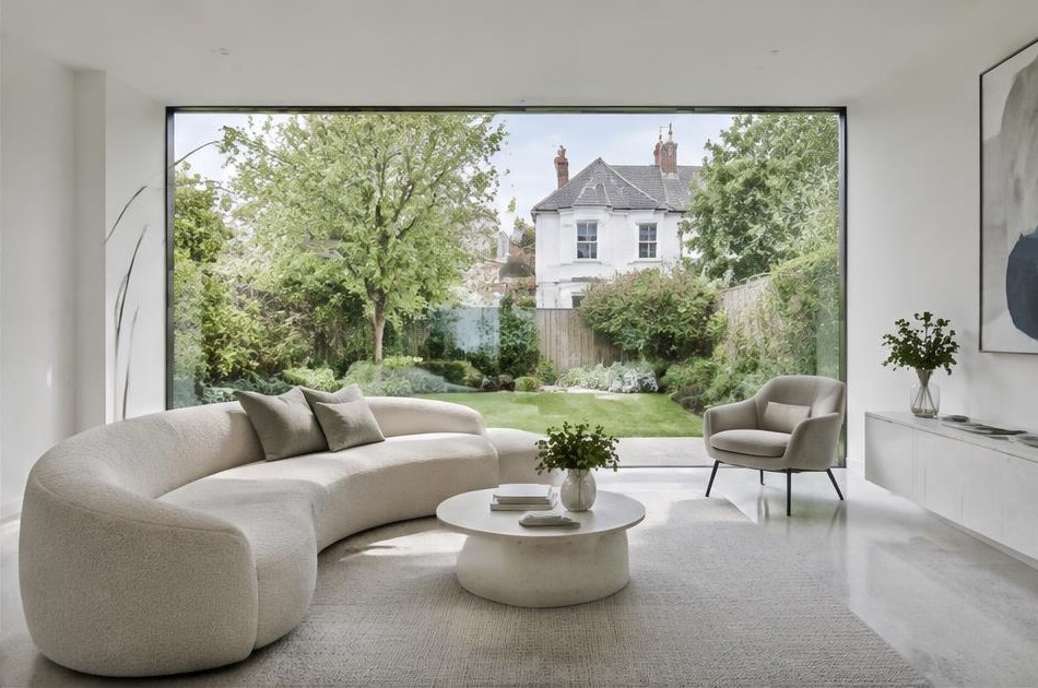 Minimalist living space with local residential garden views in Surbiton