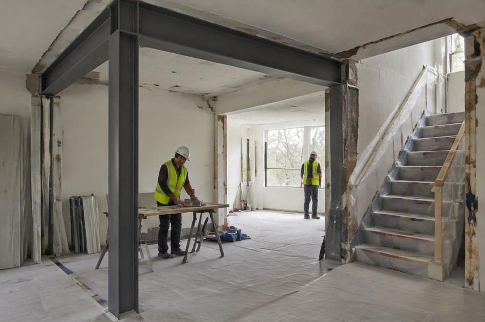 Construction work in progress on a Swiss Cottage home