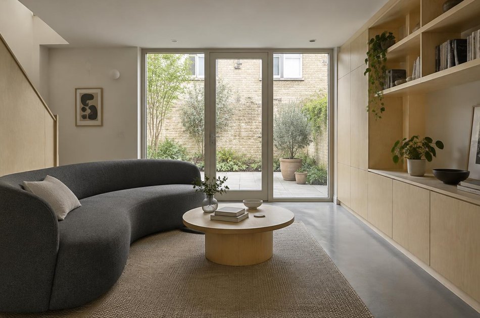 Contemporary living space opening onto a garden in Thornton Heath
