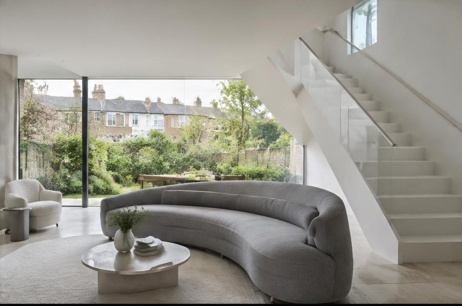 Contemporary refurbished living room with local residential garden views in Twickenham