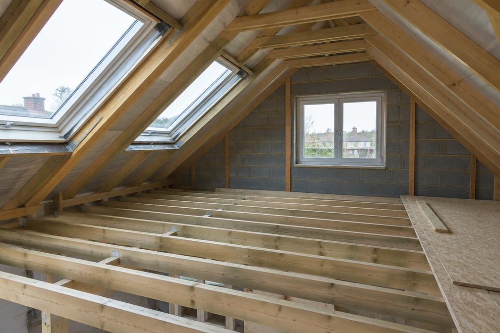 Loft conversion with new floor joists and roof windows in Waltham Forest