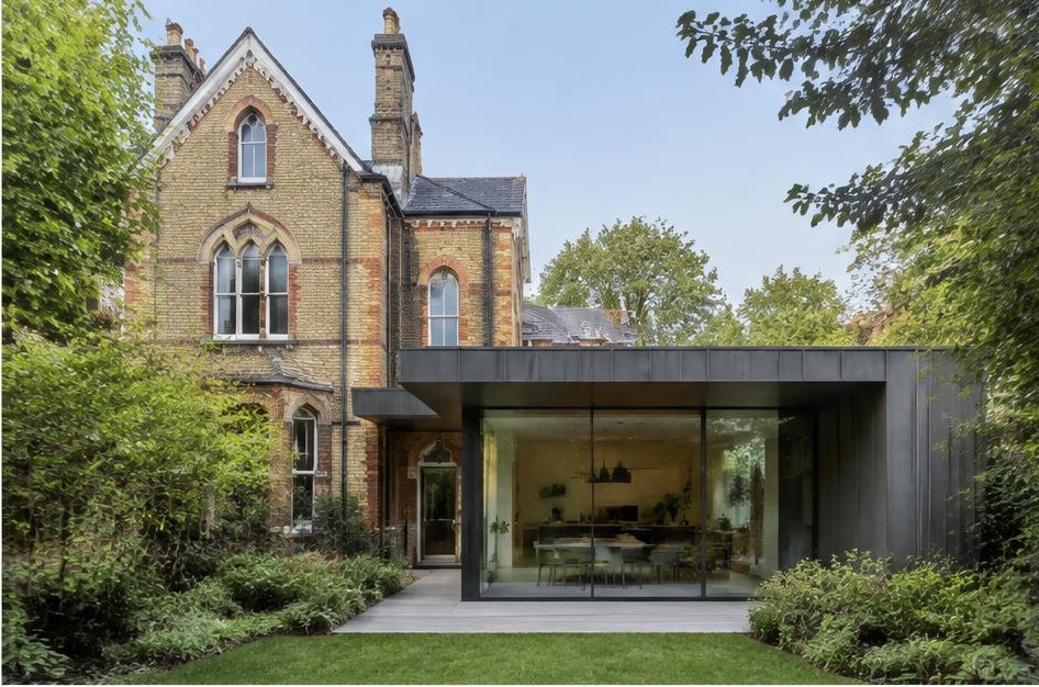 Contemporary glazed garden extension behind a period home in Wandsworth Common