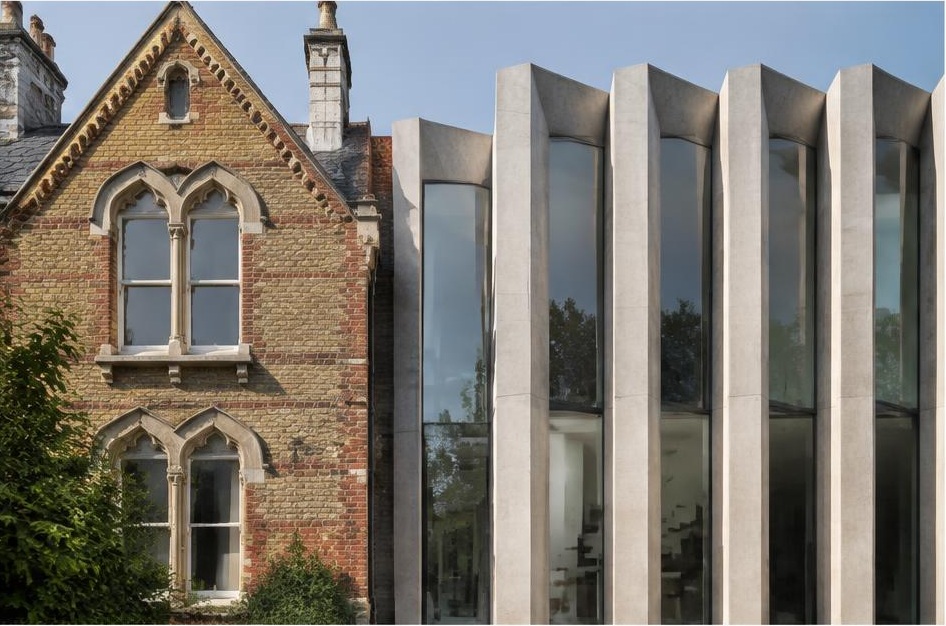 Retained period facade beside a prominent contemporary glazed addition in Wandsworth Common