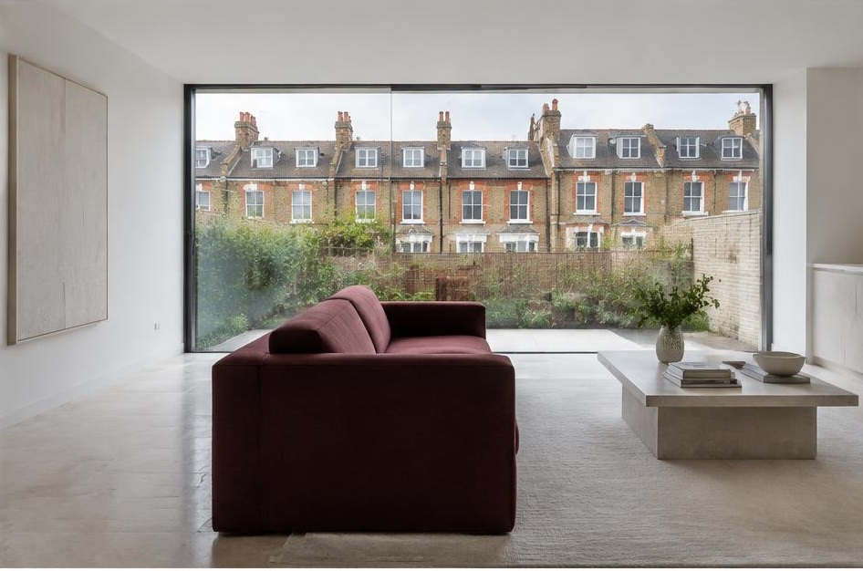 Minimalist living room with a structured fabric sofa and views of Balham homes and gardens