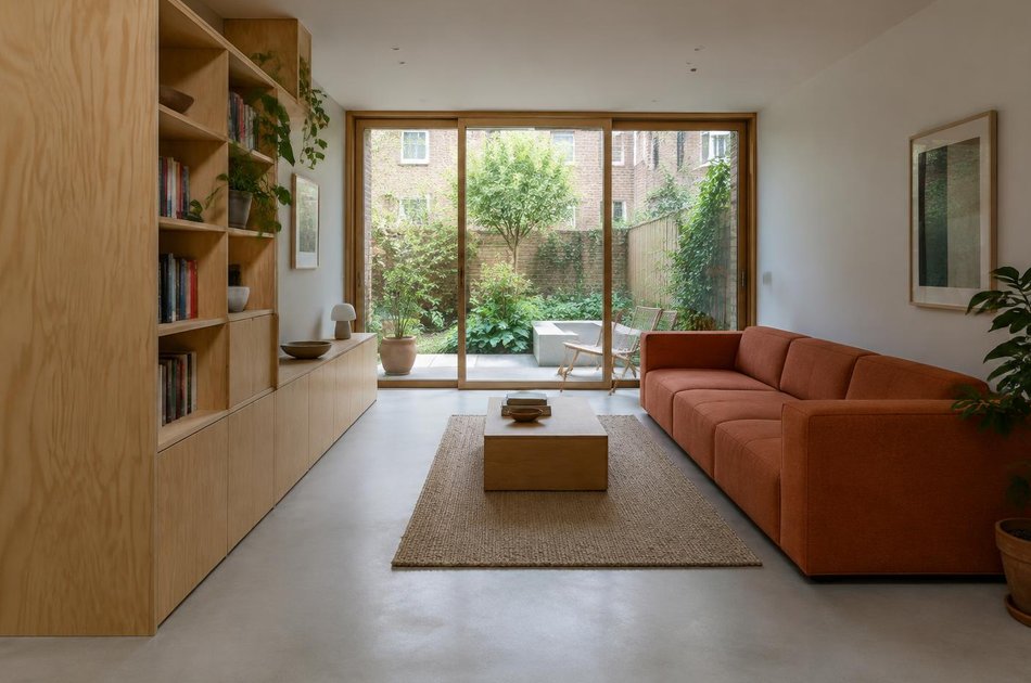 Contemporary living space opening onto a garden in Wealdstone