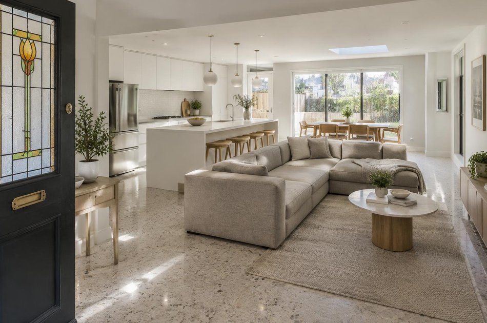 Refurbished modern interior with a retained period feature in Wembley