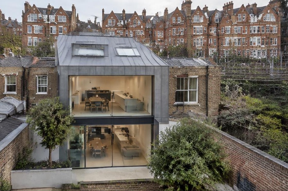 Bold contemporary architecture beside red-brick mansion blocks and terraces in West Hampstead