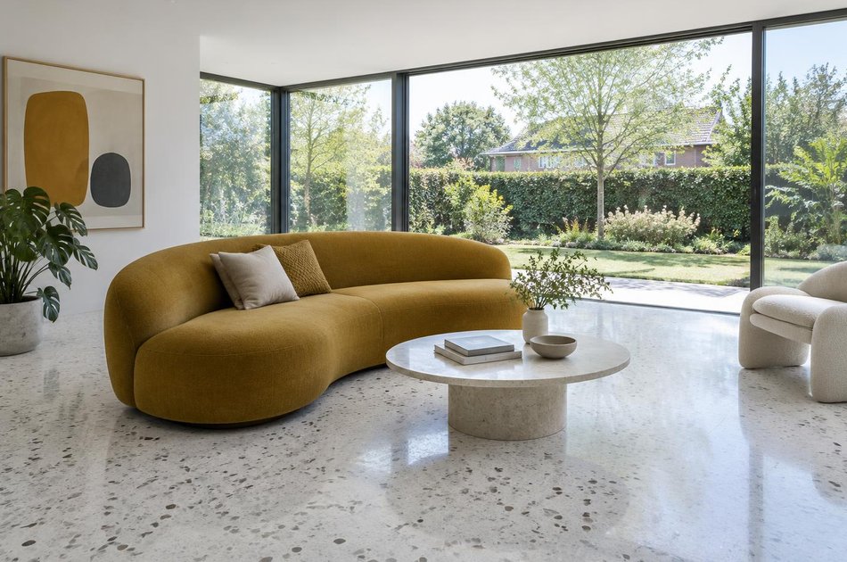 Contemporary living space opening onto a garden in West Wickham