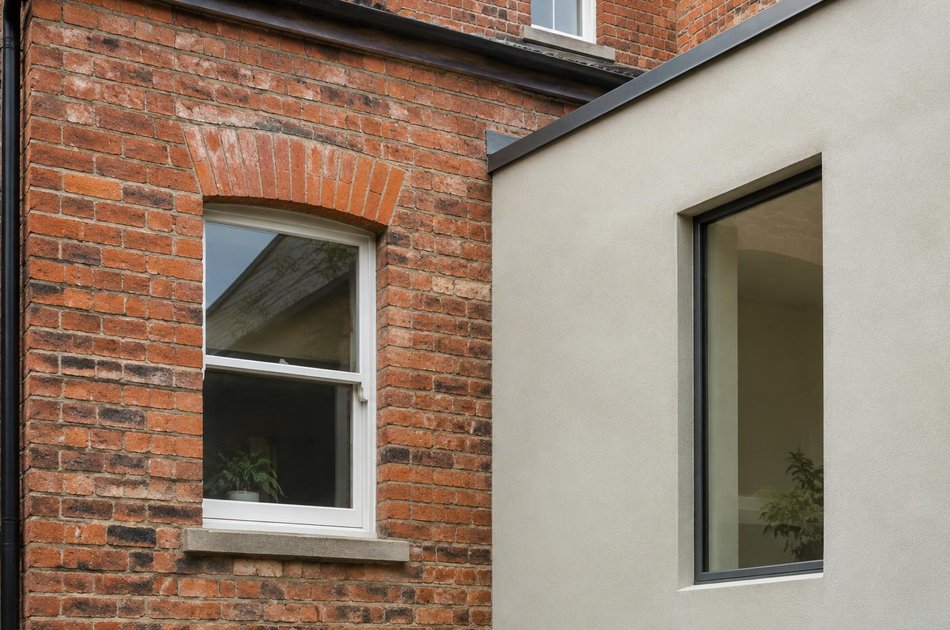 Period facade beside a new contemporary extension in Willesden Green