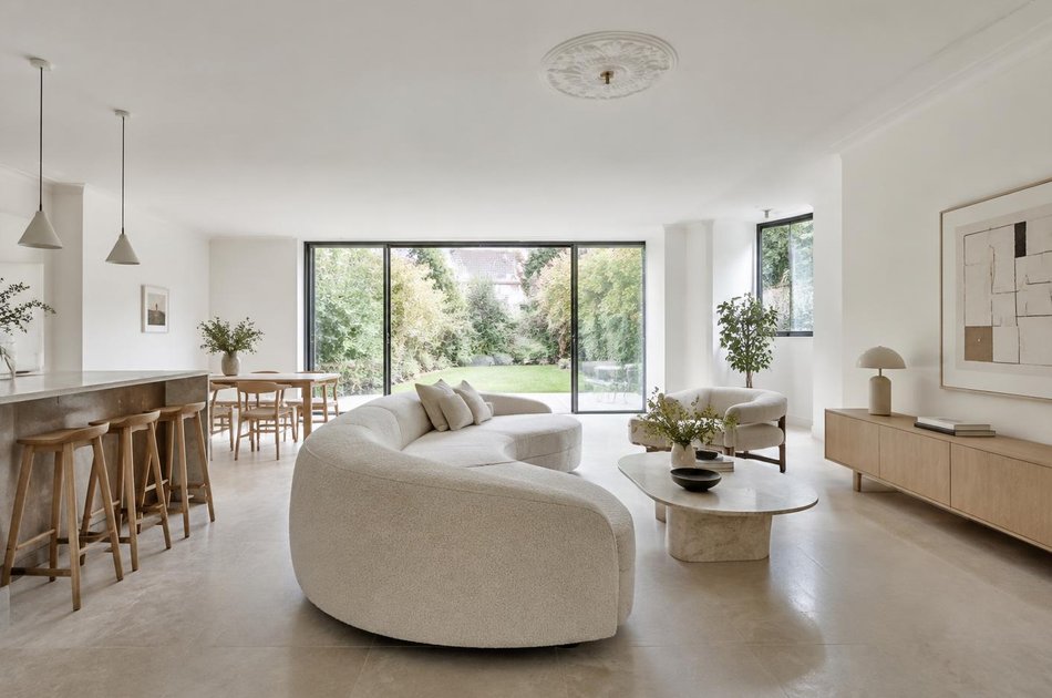 Refurbished modern interior with a retained period feature in Willesden Green